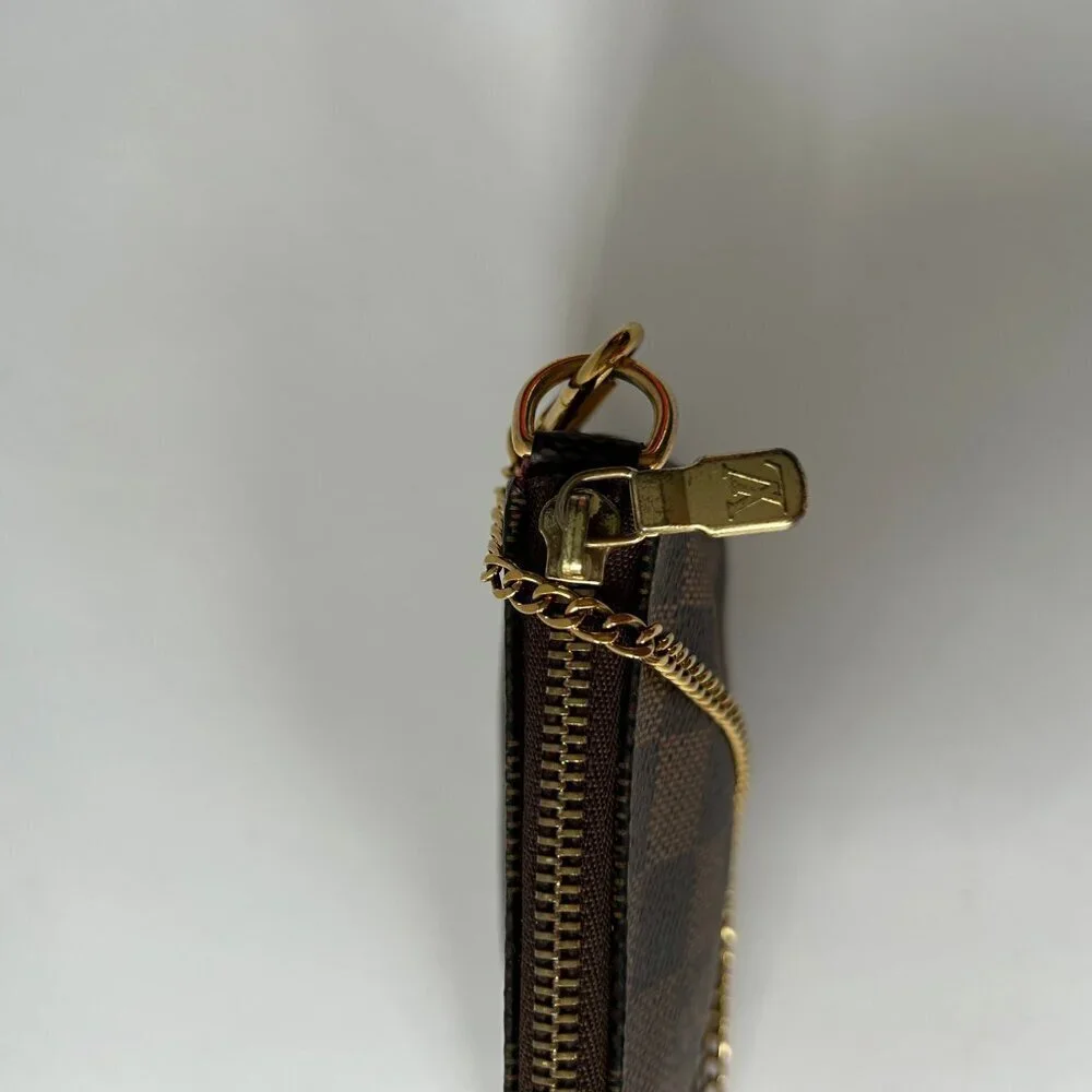 LOUIS VUITTON DAMIER EBENE MINI POCHETTE ACCESSOIRES